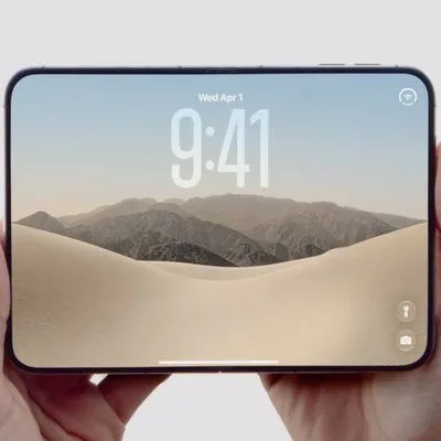 iPhone Duo closed, showing the 5.4 inch outer display on the Lock Screen